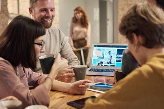 A group of colleagues discussing over coffee
